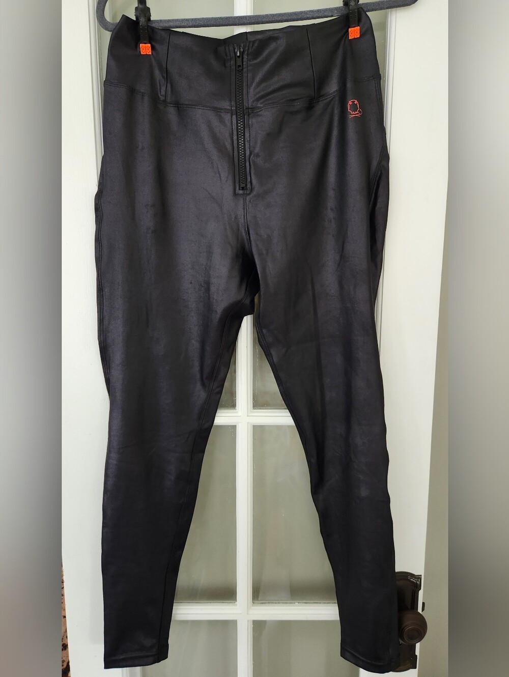 The DRIVE women's Black Faux-Leather Zip Front Pants